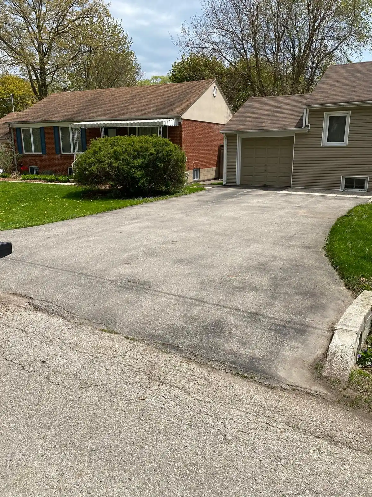 New asphalt driveway before